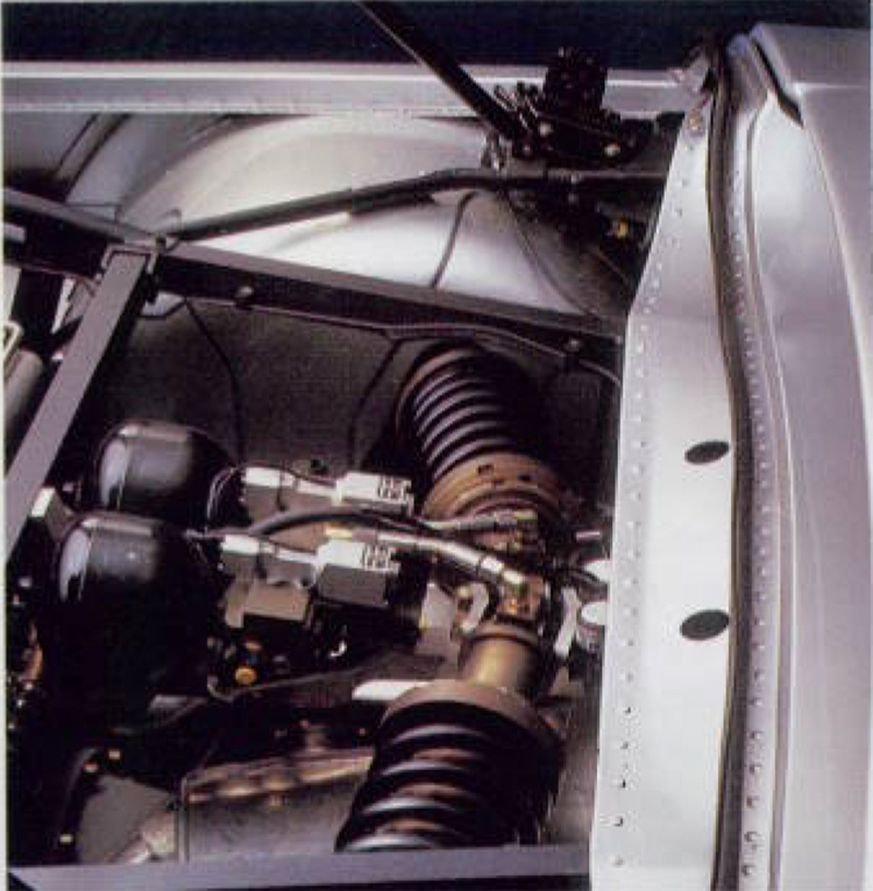 A grainy scan of Mercedes’ active rear suspension setup.